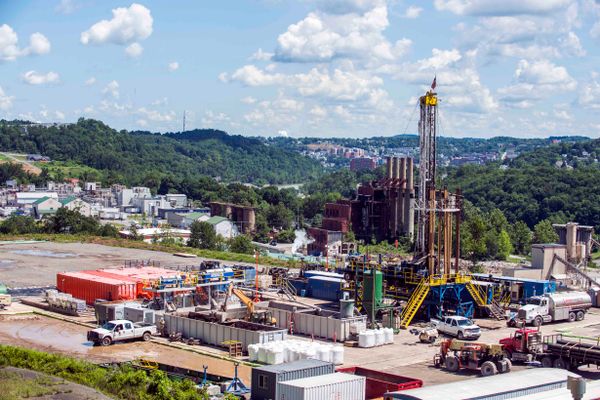 Landscape image of the Marcellus Shale Energy and Environmental Lab at the Morgantown Industrial Park overlooking the city and Mon river